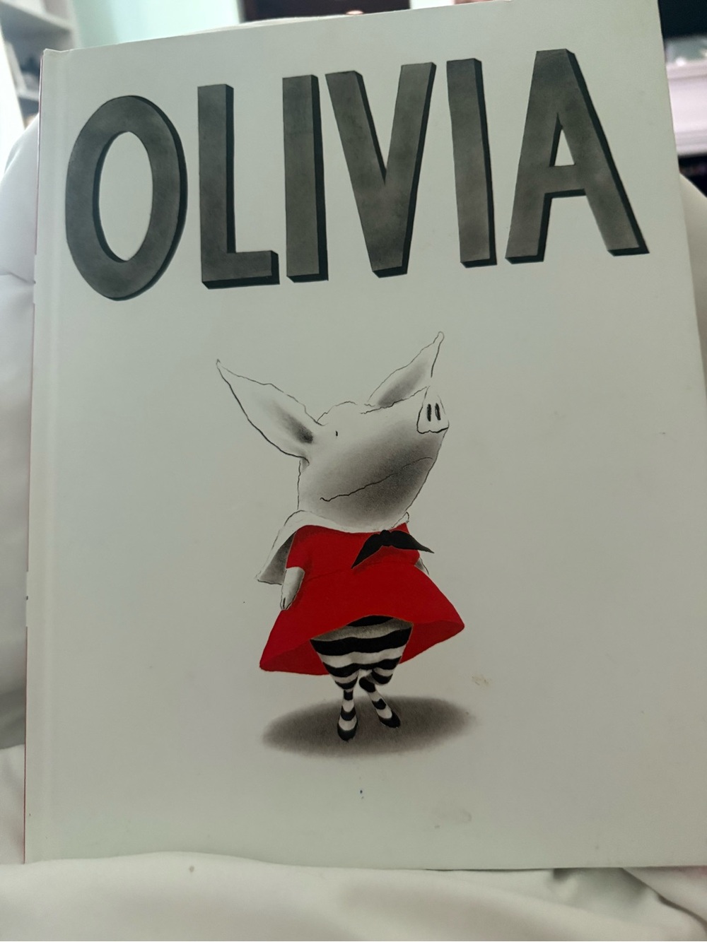 Olivia Hardcover Picture Book with Red Dress Illustration